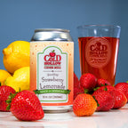 Can of Cold Hollow Cider Mill Strawberry Lemonade with a glass of cider, lemons, and strawberries on a reflective surface.
